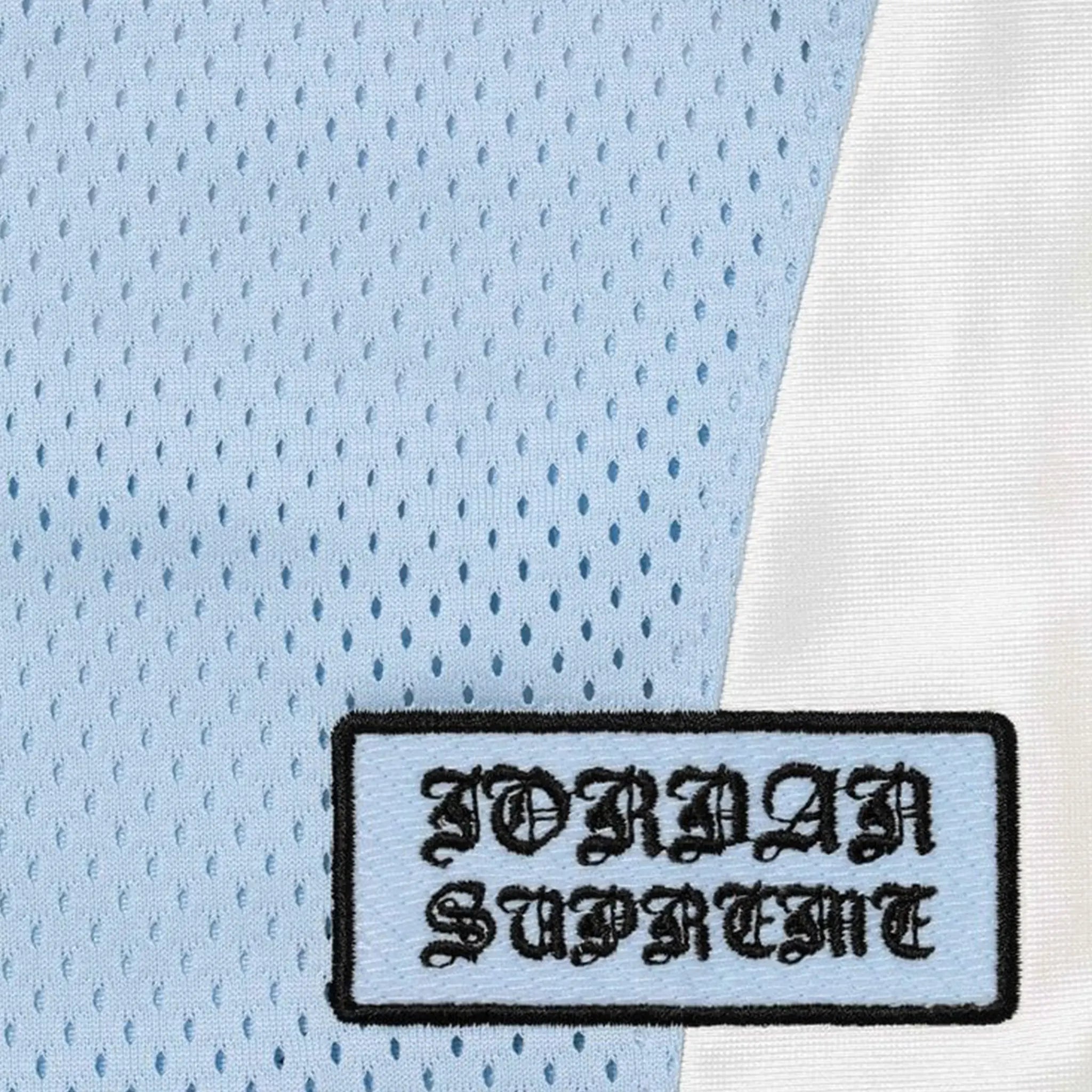 Detailed View of Supreme x Jordan Warm Up Light Blue Jersey (SS26) SS26KN23 LIGHT BLUE